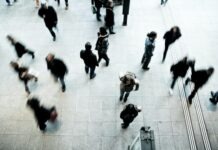 What Steps Should You Take If You’re Injured at Work? Complete Guide to Workers’ Compensation people walking on grey concrete floor during daytime