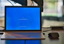 RemoveWAT Activator 64/32 Bit Free Download — What Is It and How To Use It macbook pro on brown wooden table