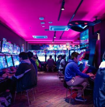 History and Social Standing of Public Gambling in Japan people sitting on chair in front of table