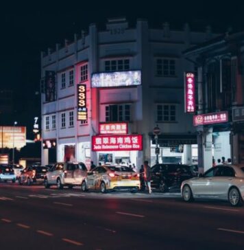 How Backlit Banners Enhance Nighttime and Indoor Advertising cars on road