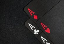 How to Use Kiss918 PNGs for Maximum Branding Impact Close-up of four aces on a black background, ideal for casino-themed content.